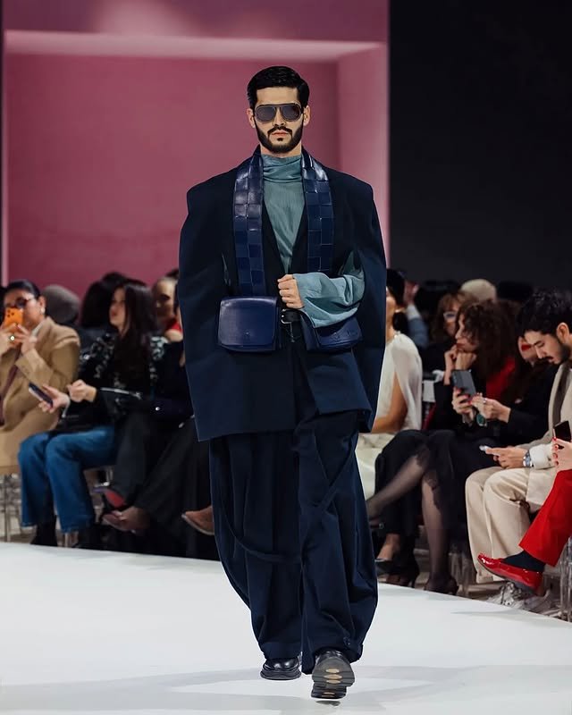 High-fashion runway editorial on stage